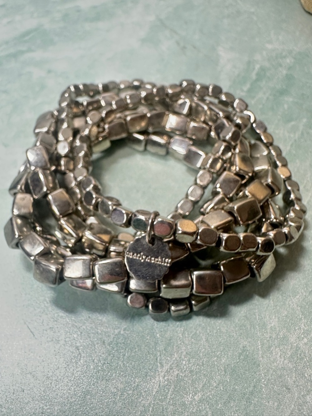 Marlyn Schiff MULTI STRAND BEADED BRACELET SET in shiny silver stretchy stack